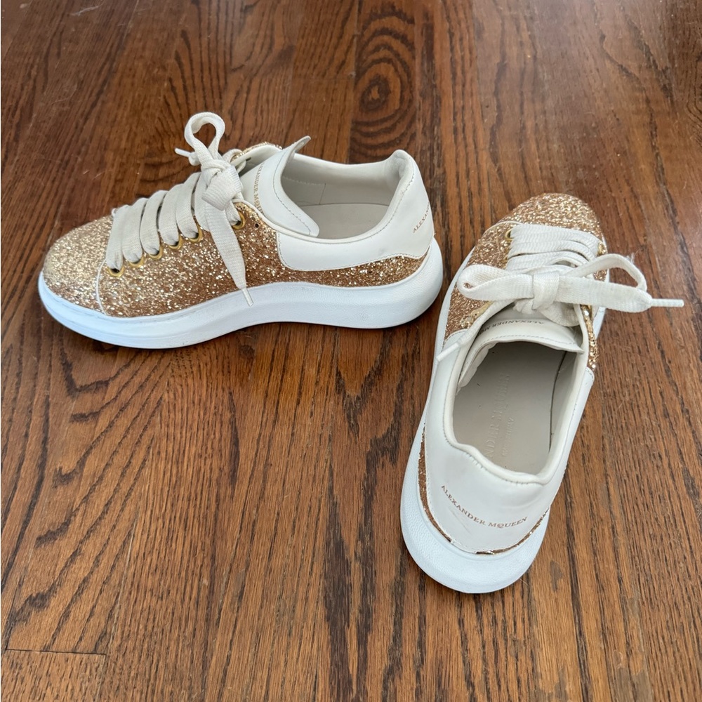 Alexander McQueen Women’s Lace Up Low Top Glitter Sneakers.